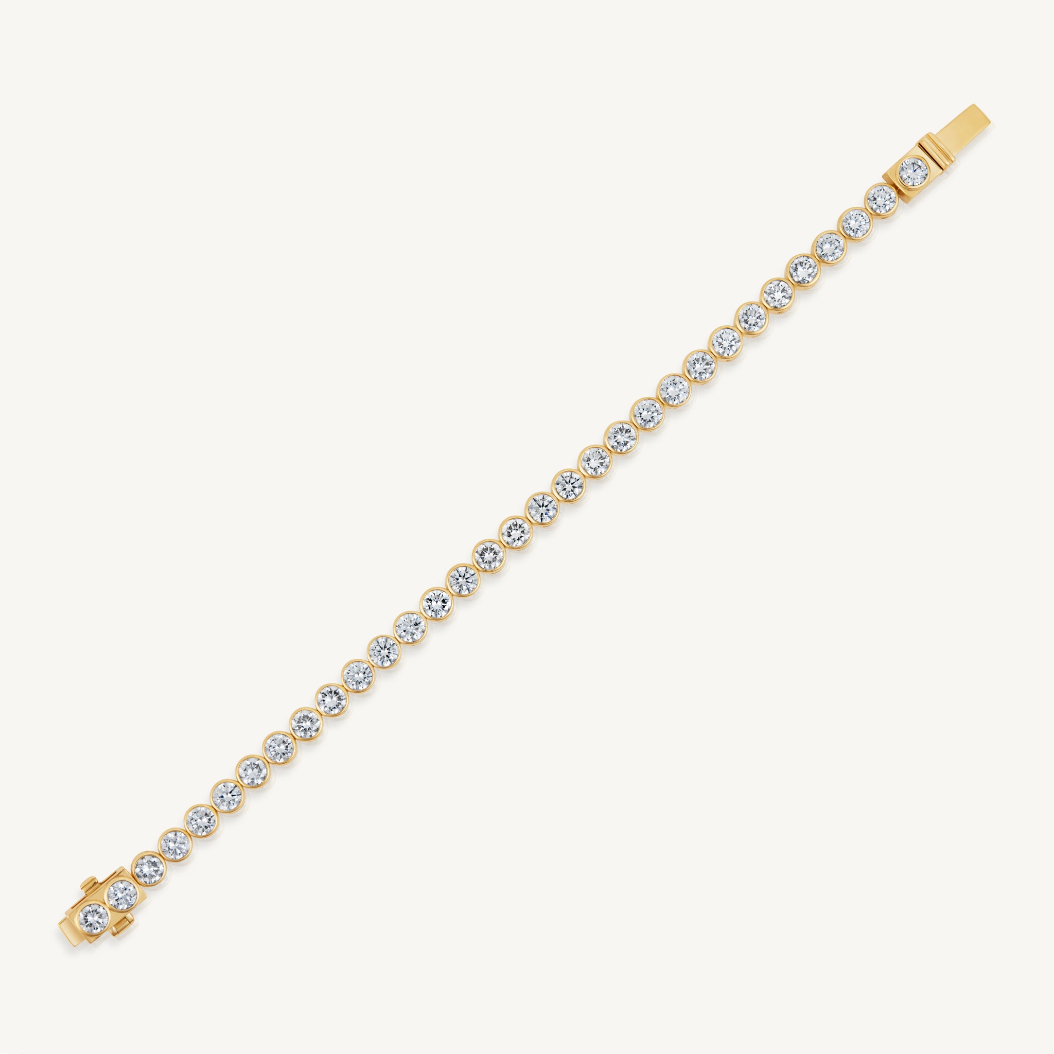 Harlow George Bezel Set Round Diamond Tennis Bracelet in 14K Yellow Gold - flat lay